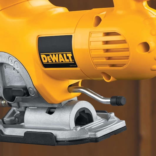Close-up image of a DEWALT-branded yellow jigsaw power tool showing the front and side details.