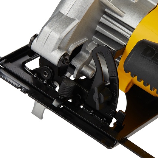 Close-up image of a DEWALT DWE5615 circular saw, showing the adjustment mechanism and part of the handle in yellow and black.