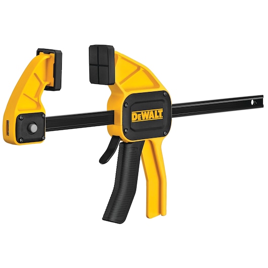 DEWALT trigger clamp tool with yellow and black design, suitable for securing materials in photography and workshop tasks.