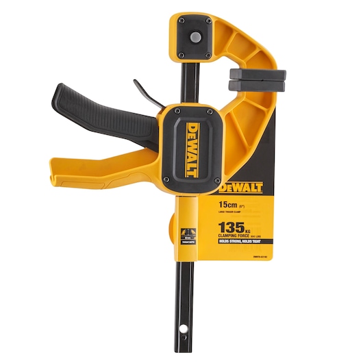 A DEWALT large trigger clamp with a yellow and black design, showing specifications including 15 cm size and 135 kg clamping force, suitable for woodworking or other clamping tasks.