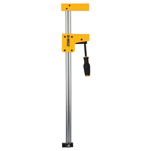 DEWALT bar clamp with yellow body, metal bar, and black handle for woodworking or clamping tasks.