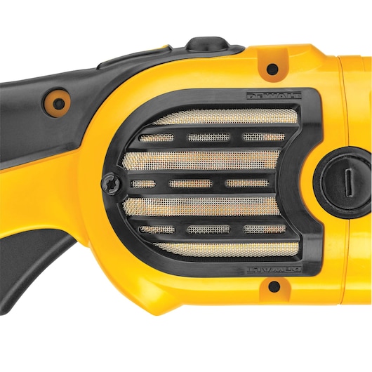 Close-up view of a DEWALT DWP849X power tool grip, showing the yellow and black plastic housing with a metal vent and branded details.