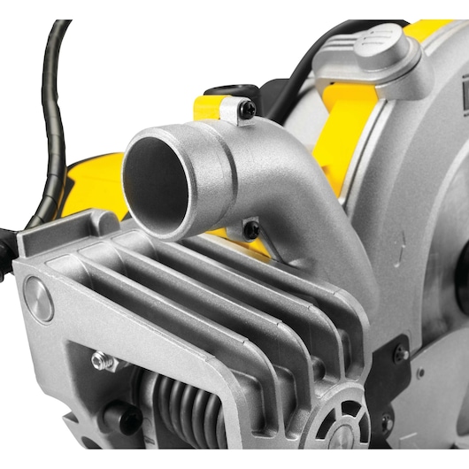 Close-up of a DEWALT miter saw metal dust extraction port and housing with visible yellow accents.