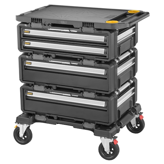 A DEWALT mobile storage cart with four black and silver drawers, mounted on wheels with locking mechanisms. The cart is robust and designed for organizing tools or equipment, featuring yellow accents and a flat top for additional workspace.