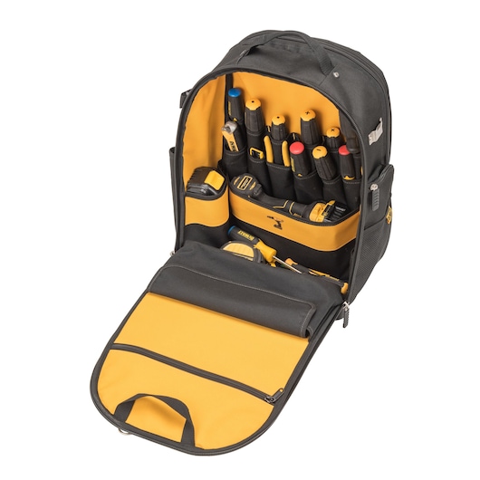 Open DEWALT tool backpack showing organized tools and compartments with yellow and black interior.