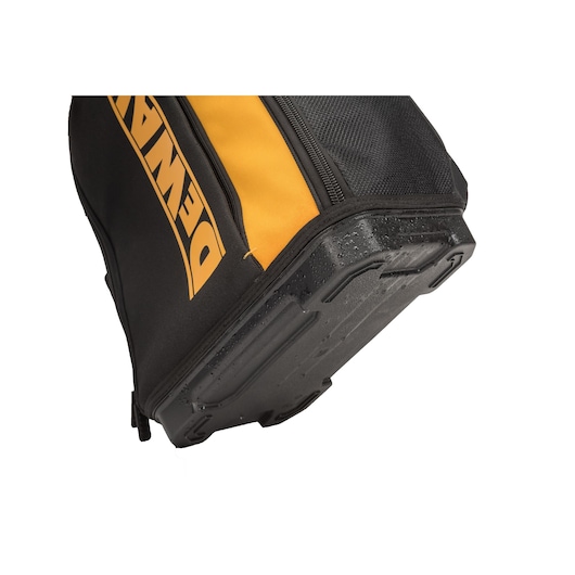 Close-up of the DEWALT tool bag base showing its durable, water-resistant black plastic bottom.