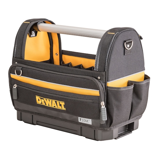 A DEWALT black and yellow open tool bag with multiple pockets, a sturdy metal handle, TSTAK branding, and zippered front pouch. The bag is designed for organizing and carrying tools.