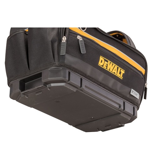 Bottom view of a black DEWALT TSTAK tool bag with zippers and reinforced plastic base.