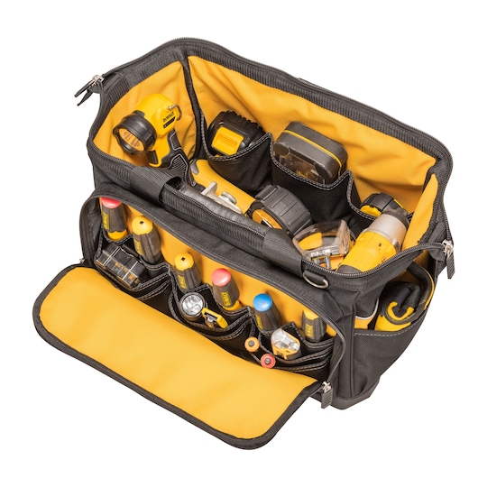 Open DEWALT tool bag with organized hand tools and accessories in yellow and black compartments.