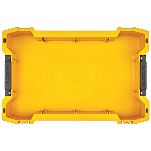 Yellow DEWALT ToughSystem storage box viewed from above, showing the open interior compartment.