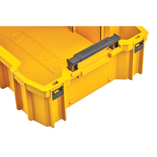 Yellow DEWALT ToughSystem storage box with black handle, shown open and empty.