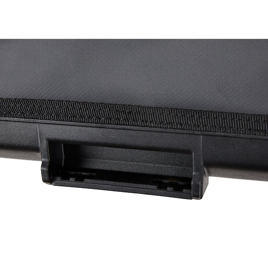 Close-up of a black DEWALT carrying case showing a latch and textured surface.
